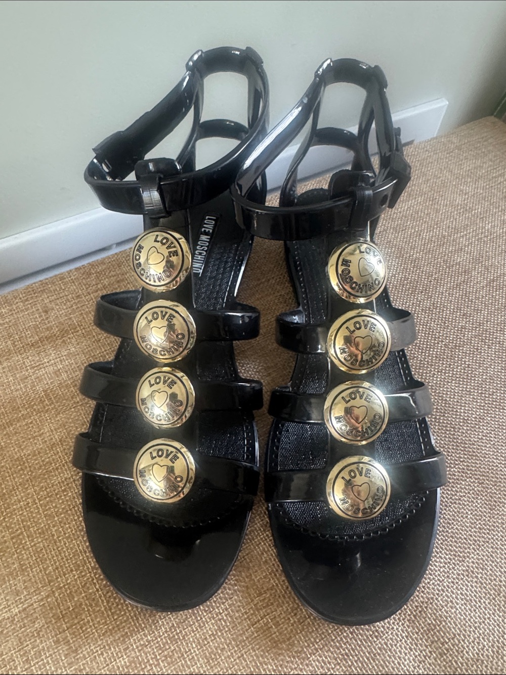 Love Moschino Black Patent Strappy Sandals with Gold Medallions